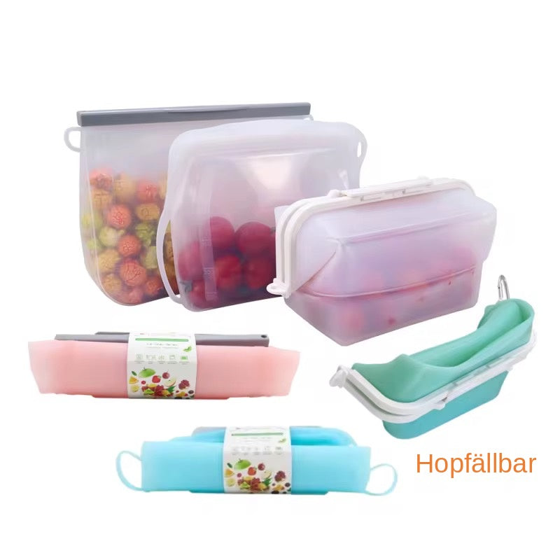 FreshSeal silikonpåsar med mat samt hoprullade och hopvikta påsar.