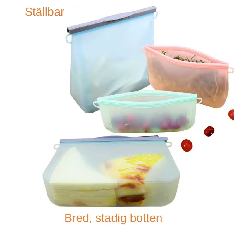  FreshSeal silikonpåsar med bred botten står upprätt med mat i.
